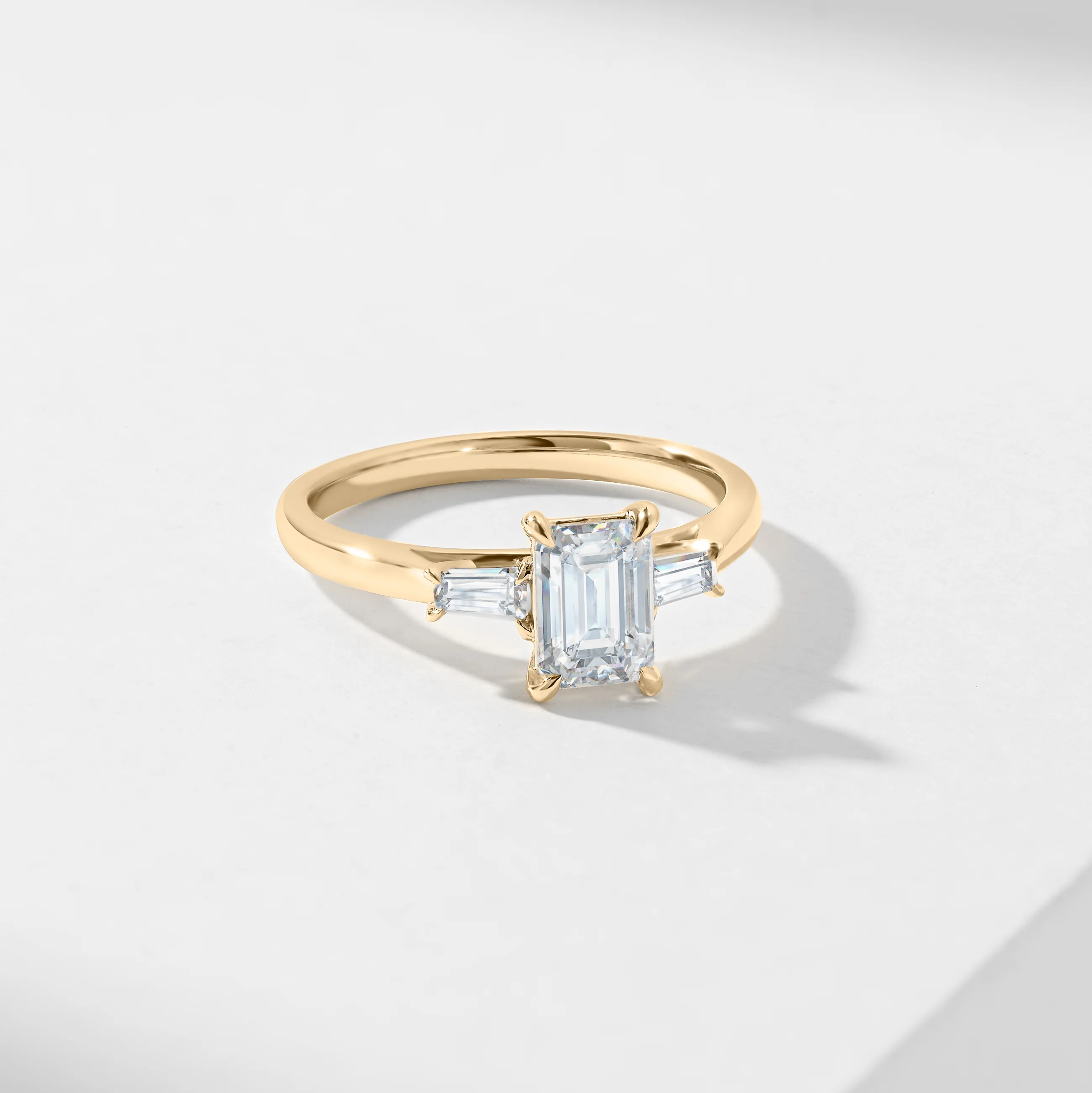 1.5ct Emerald Cut Diamond With Tapered Baguette Shoulders Trilogy Ring 1.62tdw