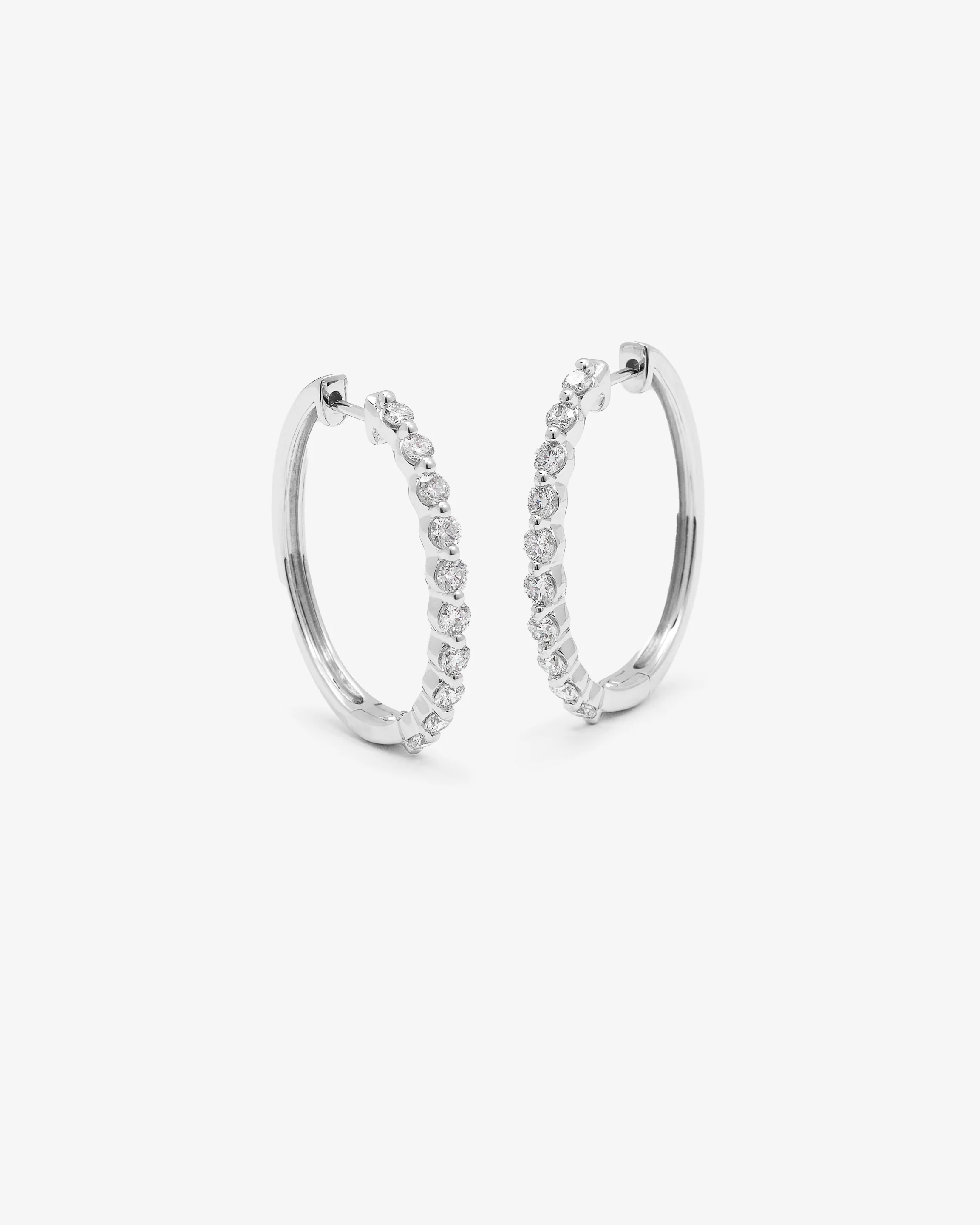 9K White Gold Round Brilliant Floating Lab Diamond Oval Huggie Earrings 1.0tdw - Image 3
