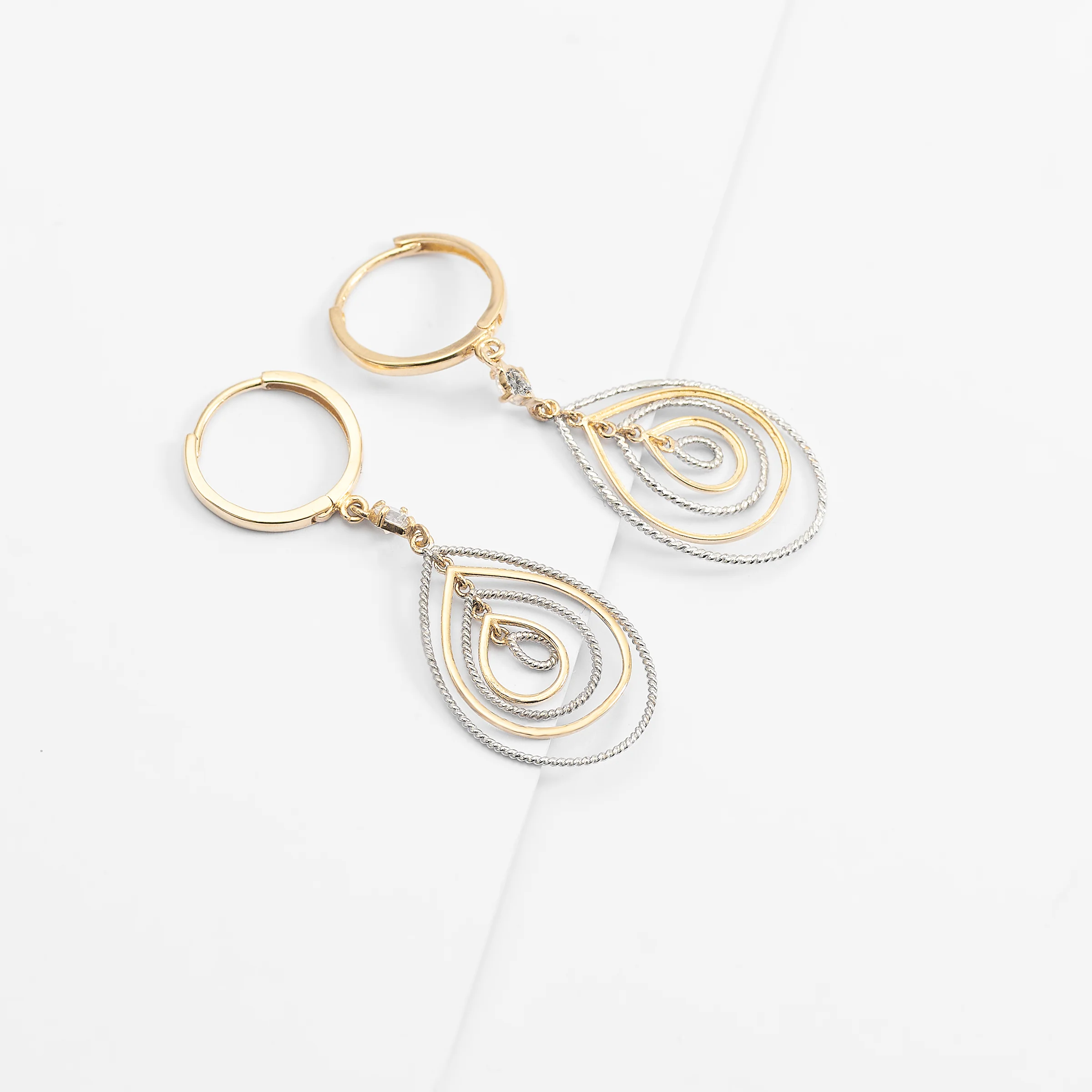 9K Yellow and White Gold Zirconia Teardrop Huggie Earrings - Image 2
