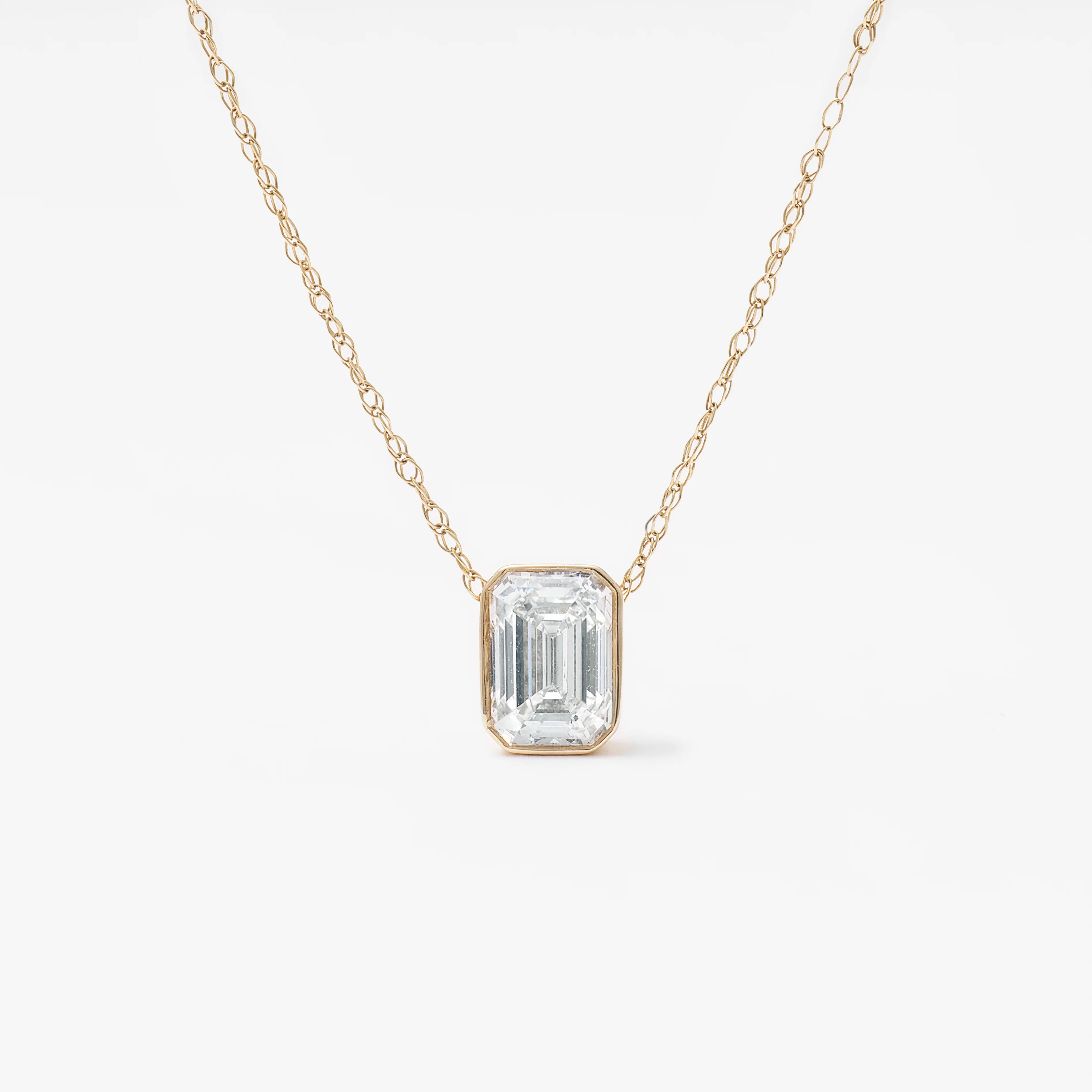 9K Yellow Gold 0.70ct Bezel Emerald Cut Lab Diamond Slider Pendant With Chain 45cm. - Image 2