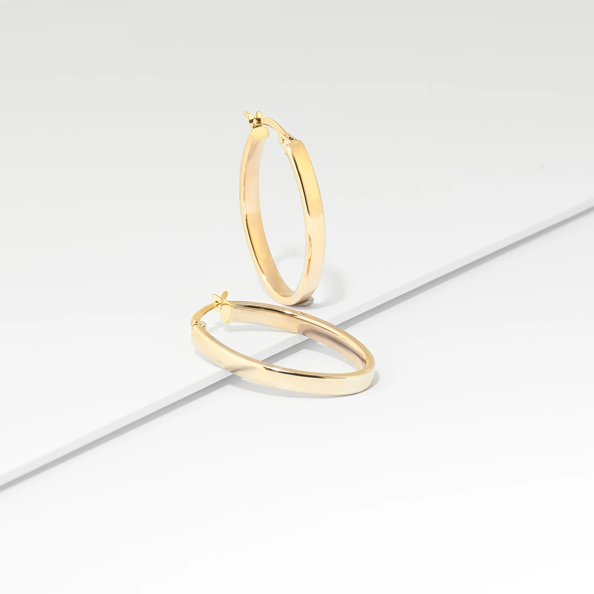 9K Yellow Gold Oval Hoop Earrings 25mm