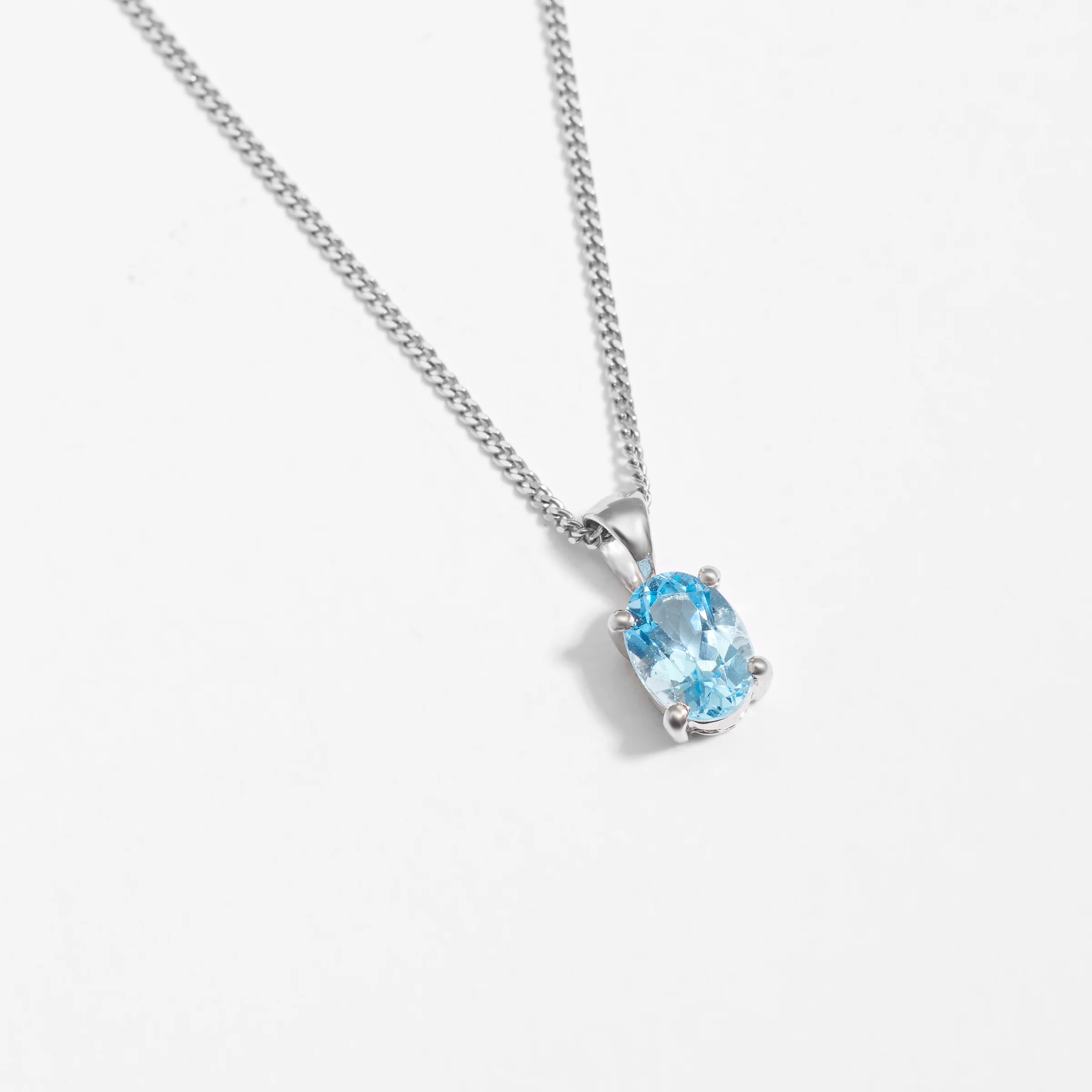 Sterling Silver Oval Swiss Blue Topaz December Birthstone Pendant