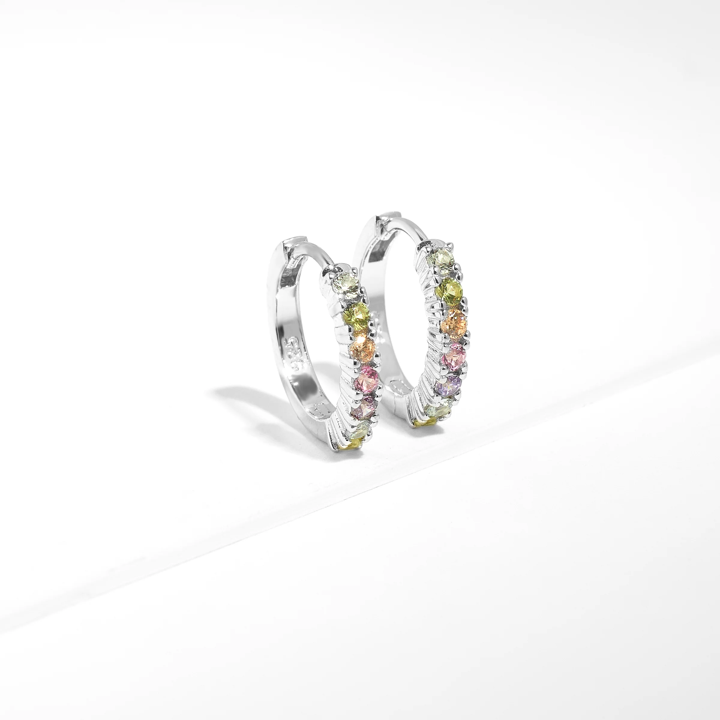 Sterling Silver Pastel Zirconia Huggie Earrings - Image 2